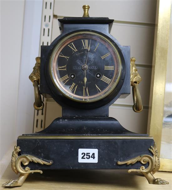 A French black marble eight day mantel clock